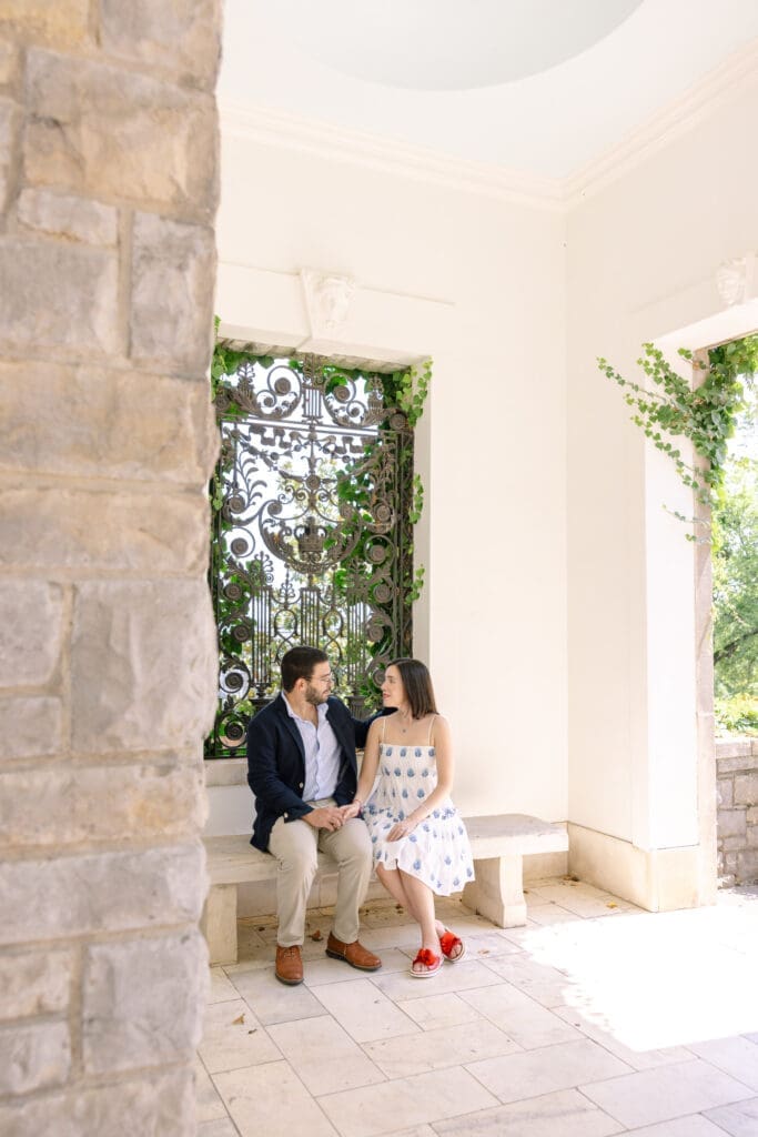 Newly engaged couple embracing in the mansion at Cheekwood Estate and Gardens Nashville TN