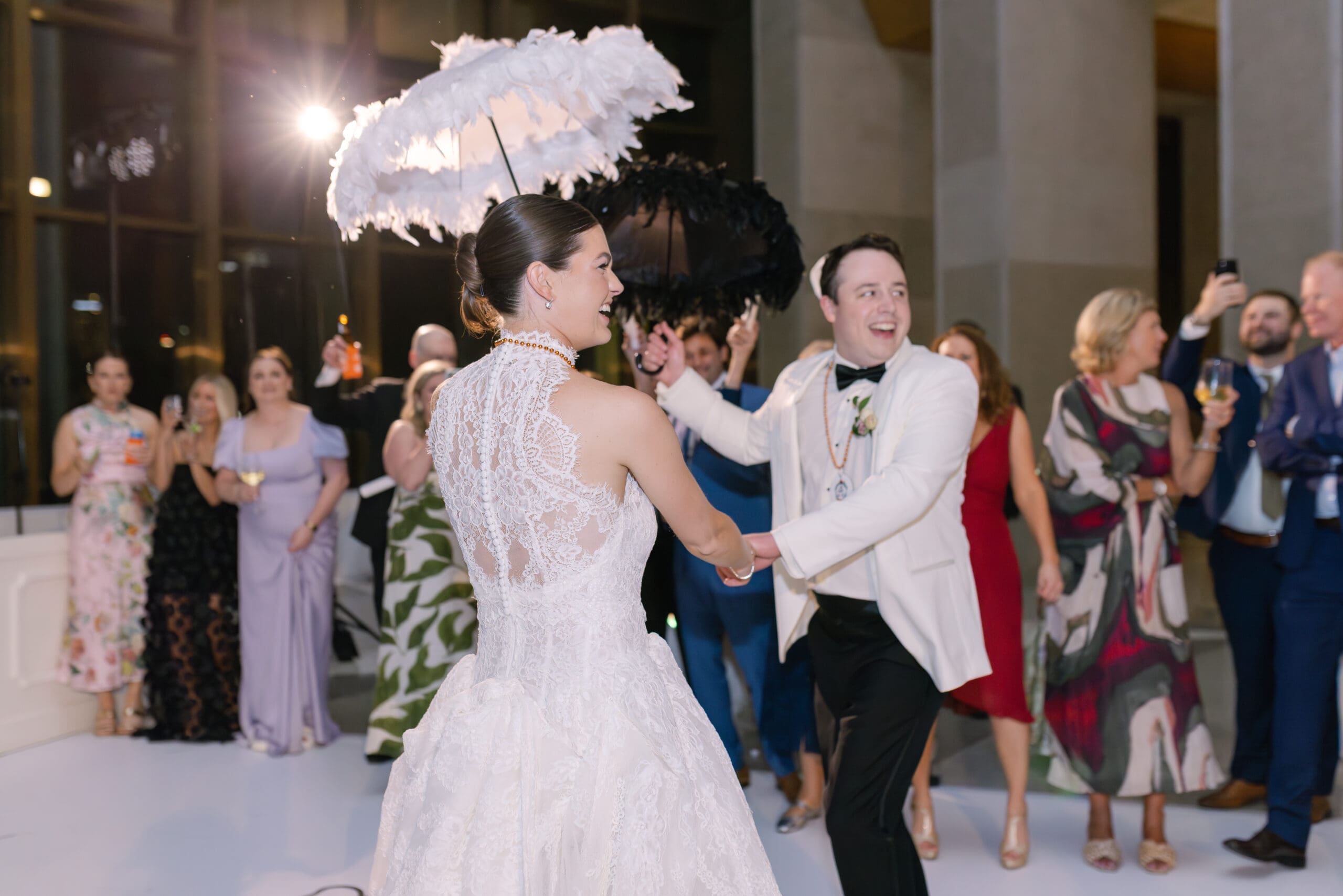 A rainy Nashville wedding day, a second-line parade entrance, cold spark exits, and a love story that began at a Mardi Gras house party — this one had it all.