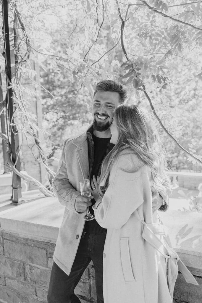 Couple sharing emotional first reaction during a surprise proposal at Cheekwood Estate and Gardens in Nashville TN