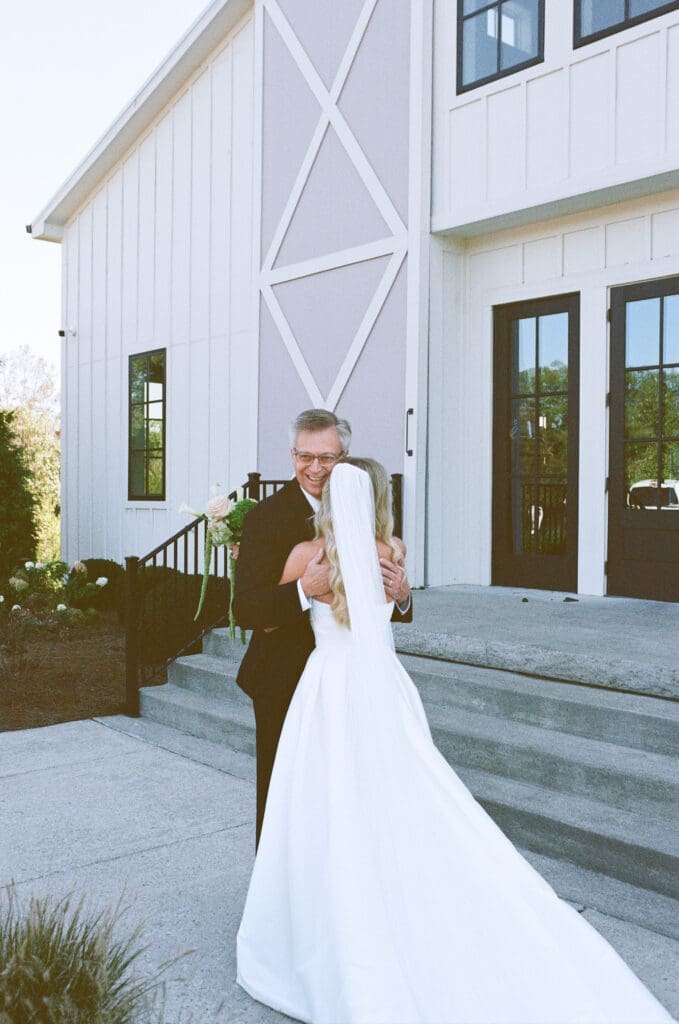 getting ready photos of the bride from A Fall Wedding at The Venue at Birchwood in Spring Hill, TN with her gorgeous bouquet by Larson Floral Design Co