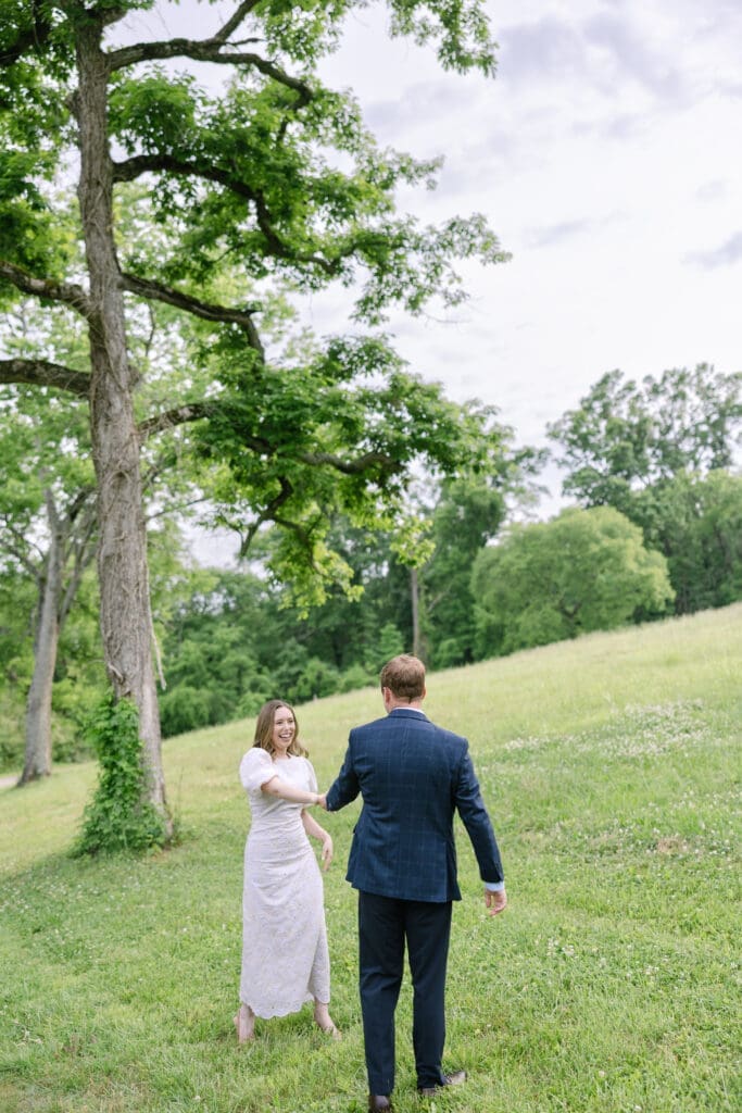Out-of-state couple dancing together during destination Nashville engagement session photographed by O Happy Day Photo