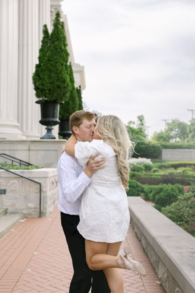 Full length fashion portrait of Katie in engagement outfit at the Parthenon Nashville