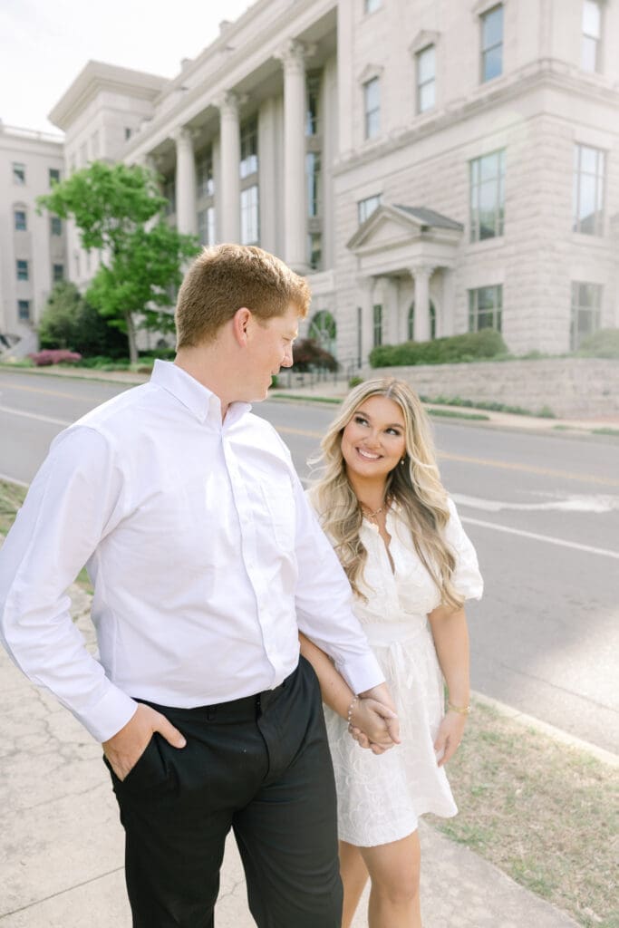 couple running through Belmonts campus in Nashville, TN