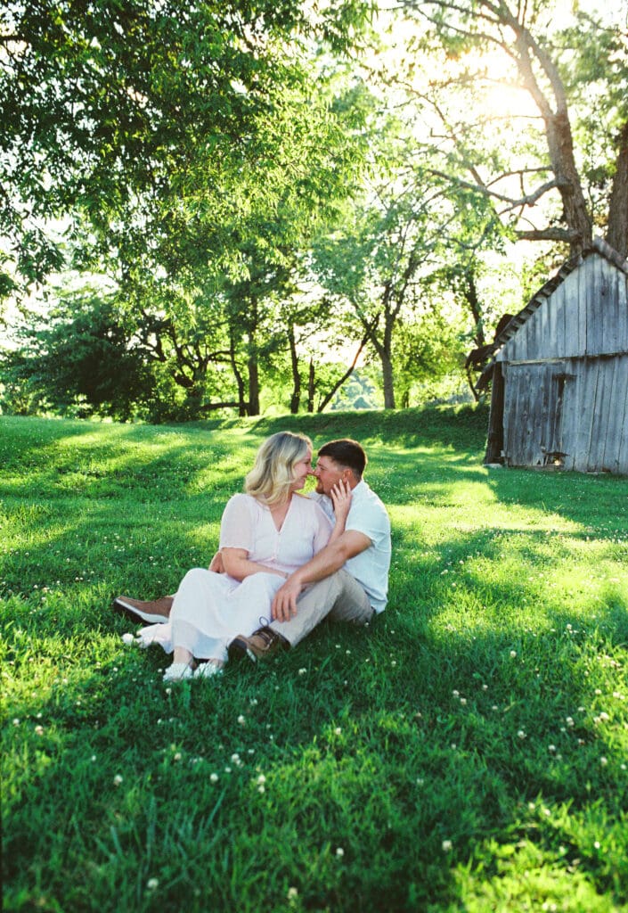 Couple embracing golden hour Harlinsdale Farm engagement session on film