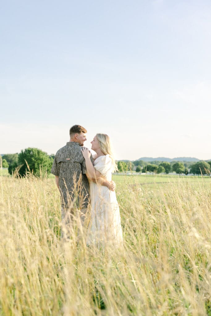 Tall grass field engagement session Harlinsdale Farm Tennessee