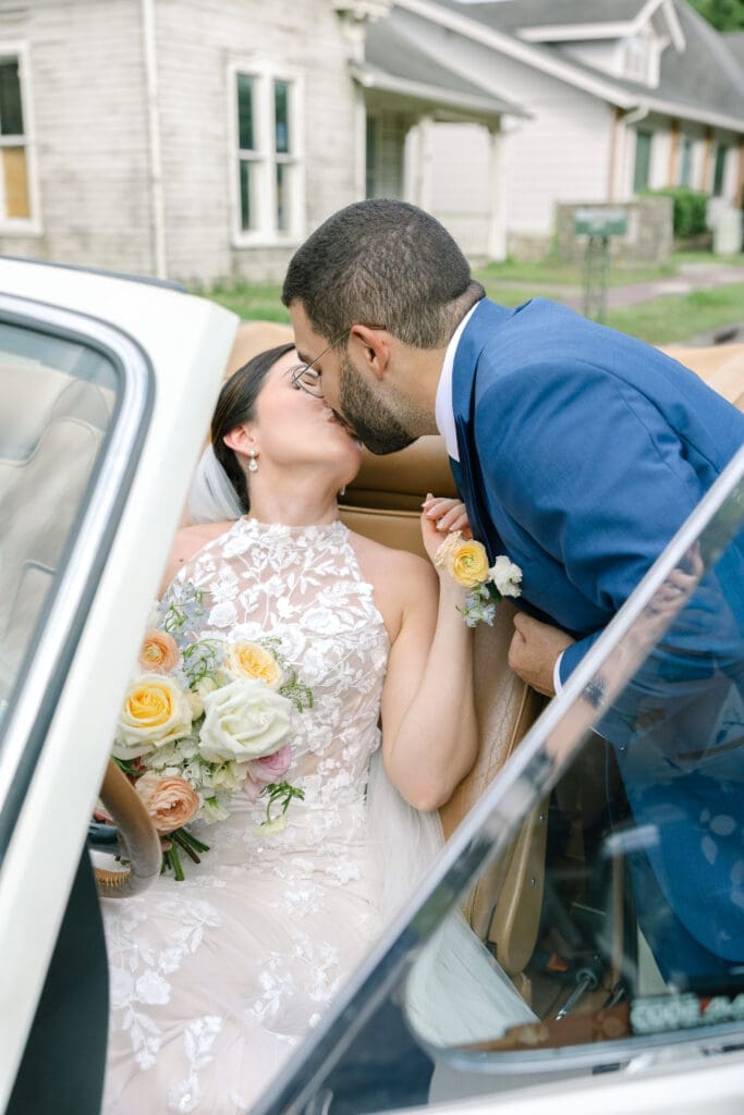 bride and groom portraits with classic rolls royce in downtown franklin, tn