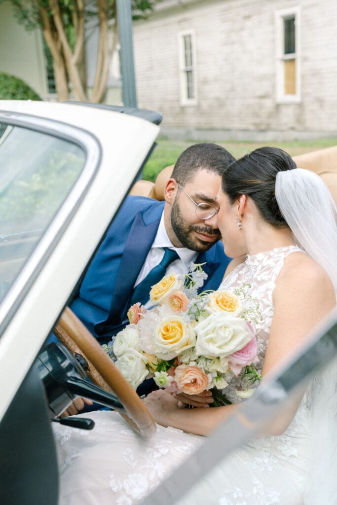 bride and groom portraits with classic rolls royce in downtown franklin, tn
