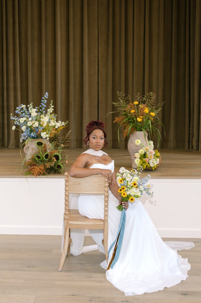 Summer heirloom wedding color palette featuring soft yellows, dusty blues, and deep greens