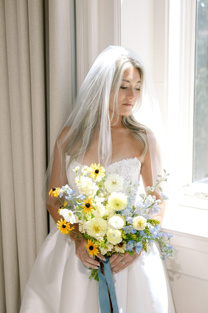 Timeless bridal gown silhouette styled for a summer heirloom wedding editorial